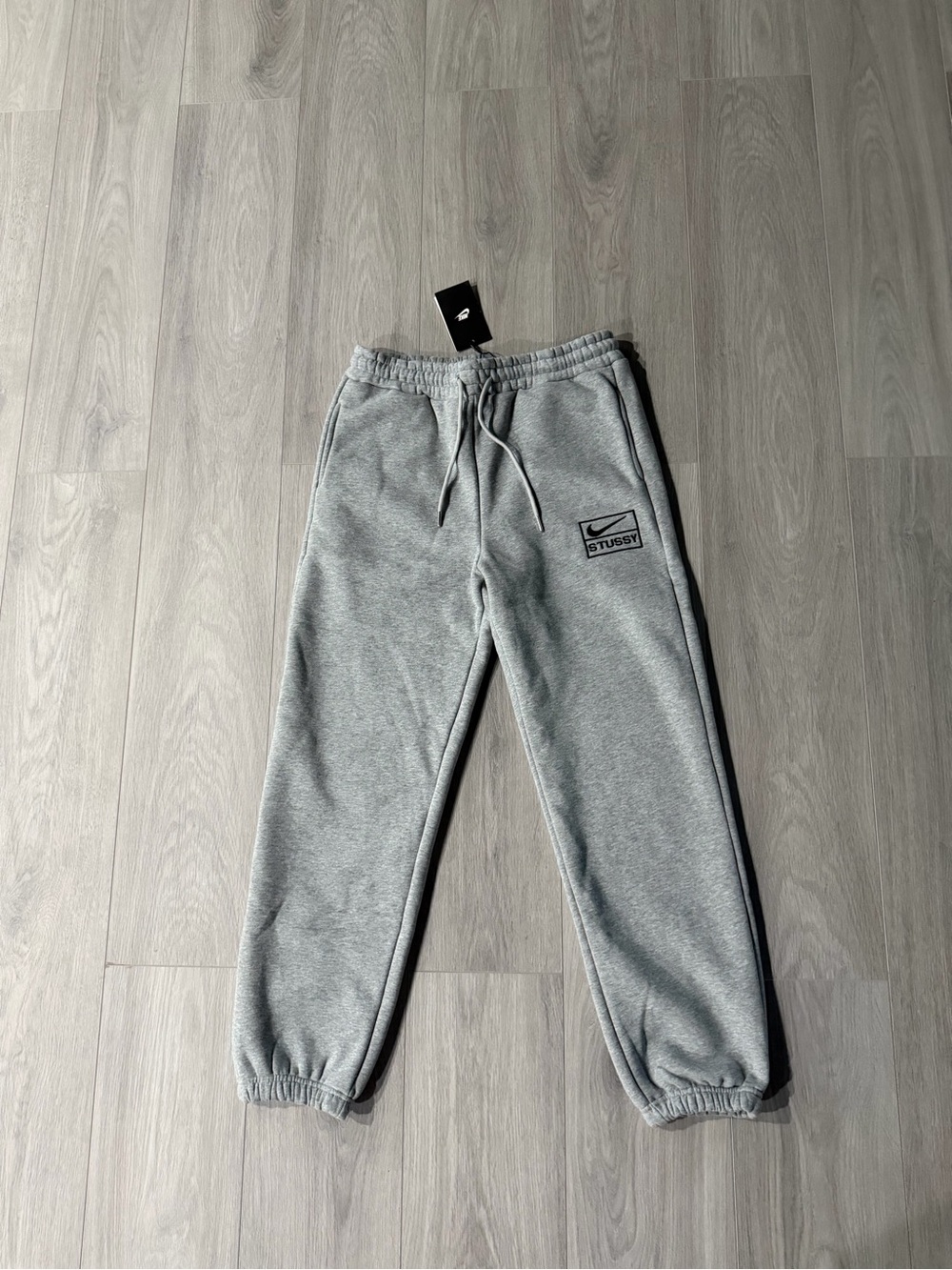 Grey NikeXStussy Sweatpants, Size Large and brand new in bag with tags